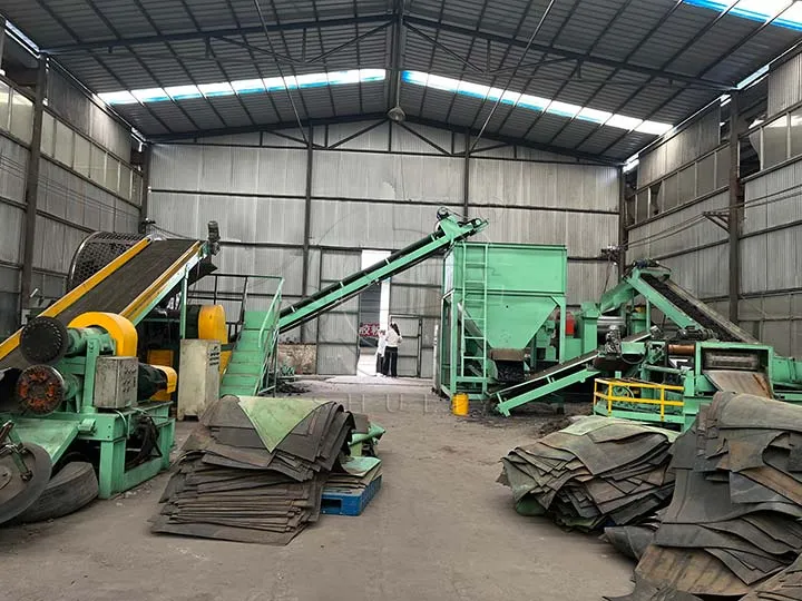 Rubber tire shredder in tire recycling factory